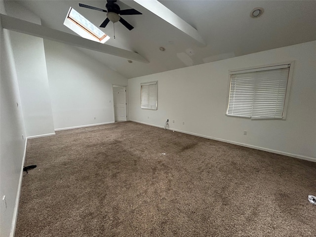 1433 Rte 208, Washingtonville, NY 10992 - empty room with a skylight, a ceiling fan, carpet flooring, lofted ceiling, and baseboards