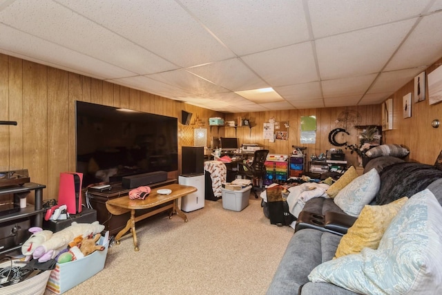 75 Massachusetts Ave, Massapequa, NY 11758 - living area with wooden walls, carpet flooring, a drop ceiling, and a desk
