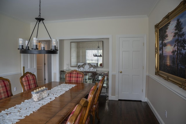 dining room featuring ornamental molding and dark wood-type flooring