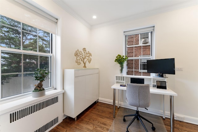 office space featuring radiator, crown molding, baseboards, wood finished floors, and recessed lighting