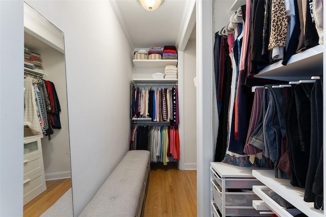 walk in closet featuring light wood-type flooring