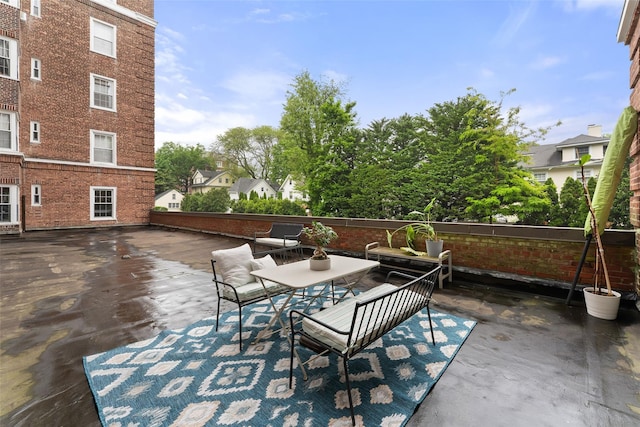 view of patio featuring outdoor dining area