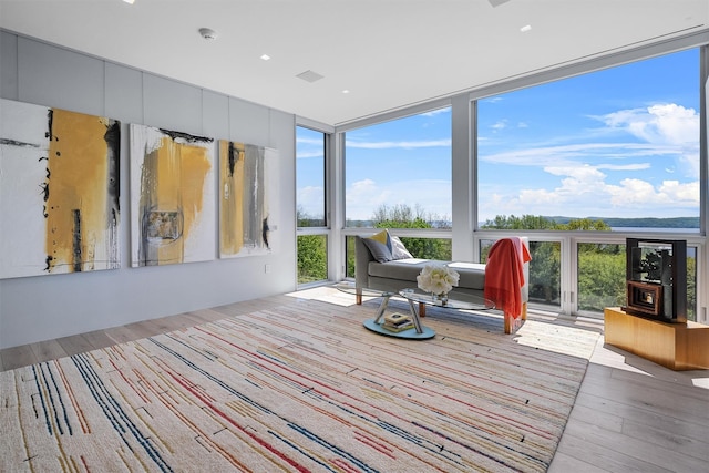 26 Mount Green Rd, Croton-On-Hudson, NY 10520 - sunroom featuring healthy amount of natural light, wood finished floors, and floor to ceiling windows