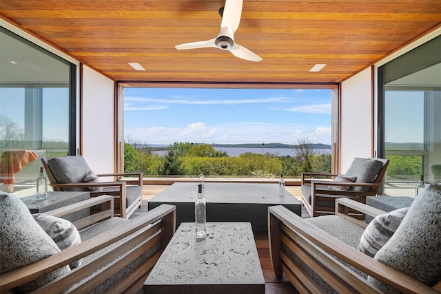 26 Mount Green Rd, Croton-On-Hudson, NY 10520 - sunroom featuring floor to ceiling windows, wood ceiling, a water view, and wood finished floors