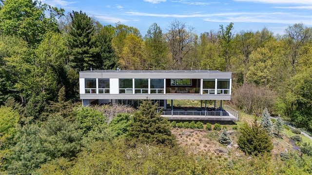 26 Mount Green Rd, Croton-On-Hudson, NY 10520 - back of property with a wooded view