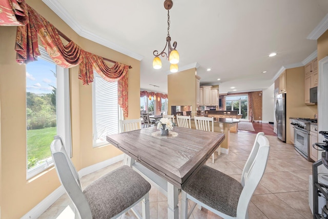 9 Fairwind Ct, Oakdale, NY 11769 - dining room with crown molding, baseboards, a chandelier, light tile patterned floors, and recessed lighting