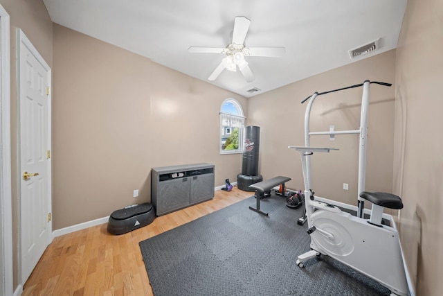9 Fairwind Ct, Oakdale, NY 11769 - exercise area with wood finished floors, ceiling fan, and baseboards