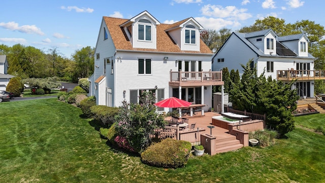 9 Fairwind Ct, Oakdale, NY 11769 - rear view of property featuring a wooden deck and a lawn