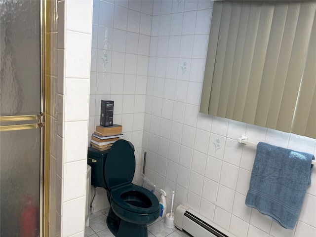 6 Annette Ln, East Moriches, NY 11940 - bathroom featuring tile walls, tile patterned floors, toilet, a shower with door, and baseboard heating