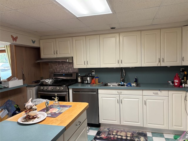 6 Annette Ln, East Moriches, NY 11940 - kitchen featuring appliances with stainless steel finishes, a sink, a drop ceiling, white cabinets, and wooden counters