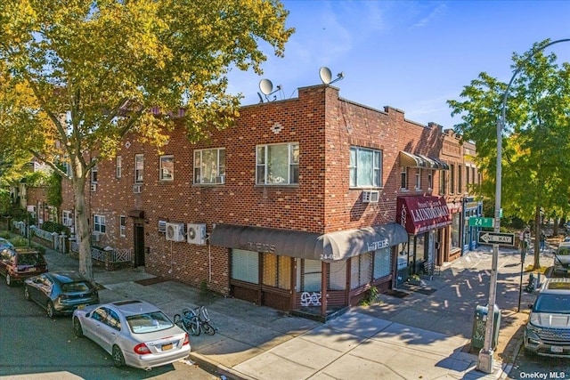 24-01 23rd Ave, Astoria, NY 11105 - view of building exterior with concrete driveway and cooling unit