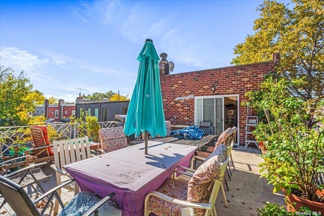24-01 23rd Ave, Astoria, NY 11105 - view of patio with outdoor dining area