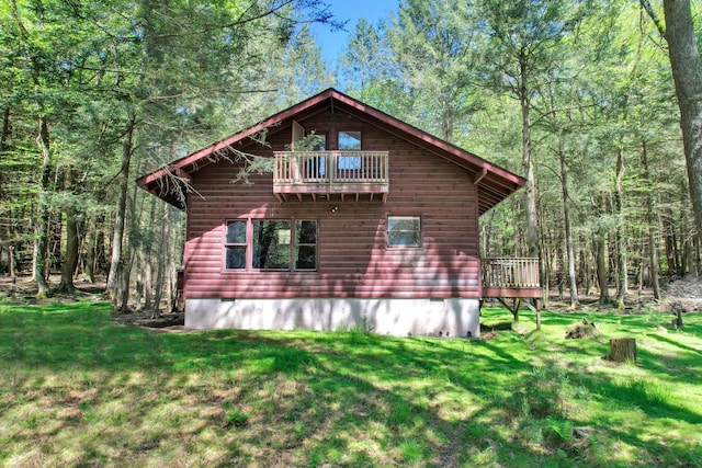 60 Park Road Ext, Eldred, NY 12792 - view of side of property featuring a balcony, a yard, and a view of trees