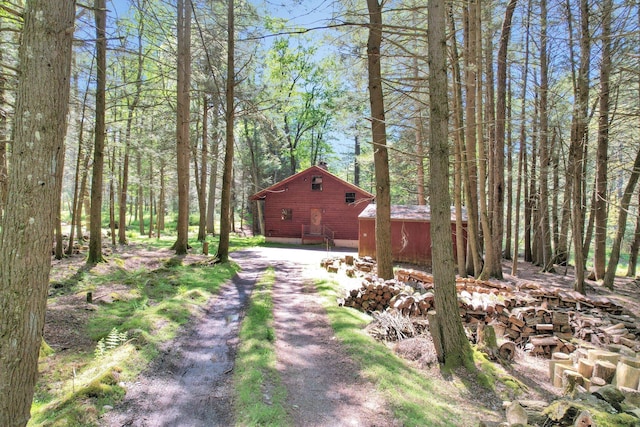60 Park Road Ext, Eldred, NY 12792 - view of yard featuring an outdoor structure, a forest view, and driveway