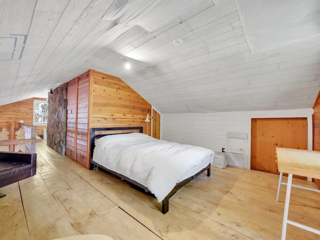60 Park Road Ext, Eldred, NY 12792 - bedroom with wood walls, lofted ceiling, and hardwood / wood-style floors