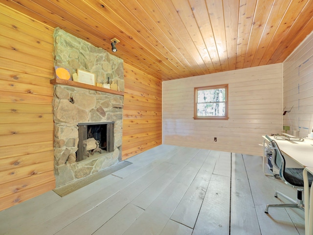 60 Park Road Ext, Eldred, NY 12792 - unfurnished office featuring wooden ceiling, wooden walls, a stone fireplace, and wood finished floors
