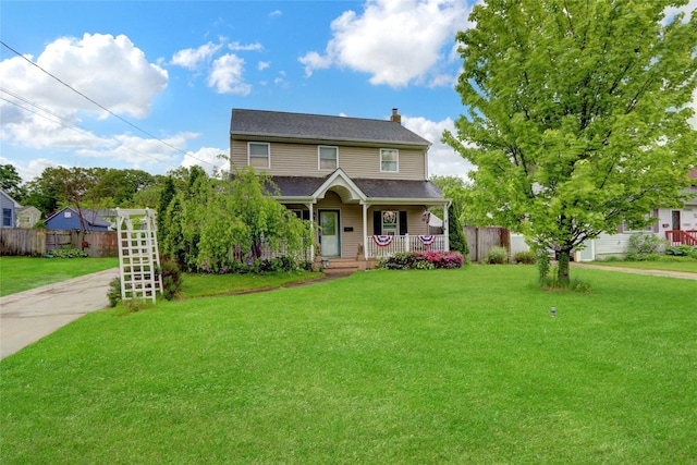 24 Haynes Ave, West Islip, NY 11795 - view of front of home featuring a porch, a chimney, and a shingled roof