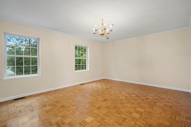 unfurnished room with a chandelier, baseboards, plenty of natural light, and ornamental molding