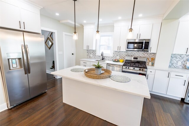 kitchen featuring stainless steel appliances, dark wood-style flooring, tasteful backsplash, and recessed lighting