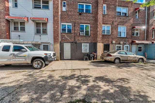 view of front of house featuring brick siding