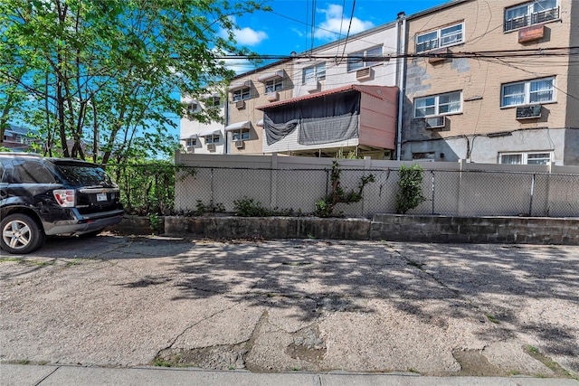 view of property featuring fence