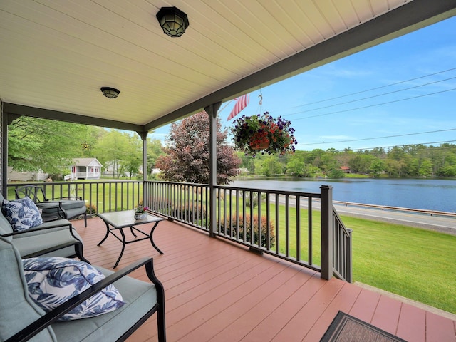 229 Eldred Yulan Rd, Eldred, NY 12792 - wooden terrace featuring a water view, a yard, and view of scattered trees