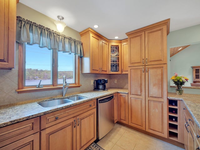 229 Eldred Yulan Rd, Eldred, NY 12792 - kitchen featuring stainless steel dishwasher, a sink, light stone countertops, decorative backsplash, and glass insert cabinets
