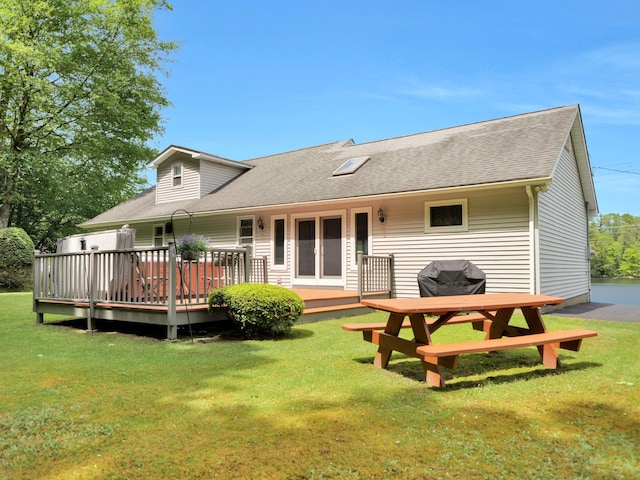 229 Eldred Yulan Rd, Eldred, NY 12792 - back of property featuring a wooden deck, a yard, and roof with shingles