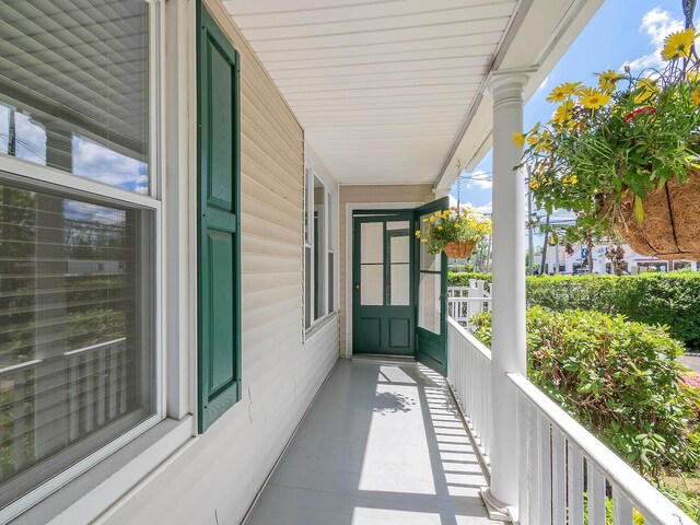 balcony featuring a porch