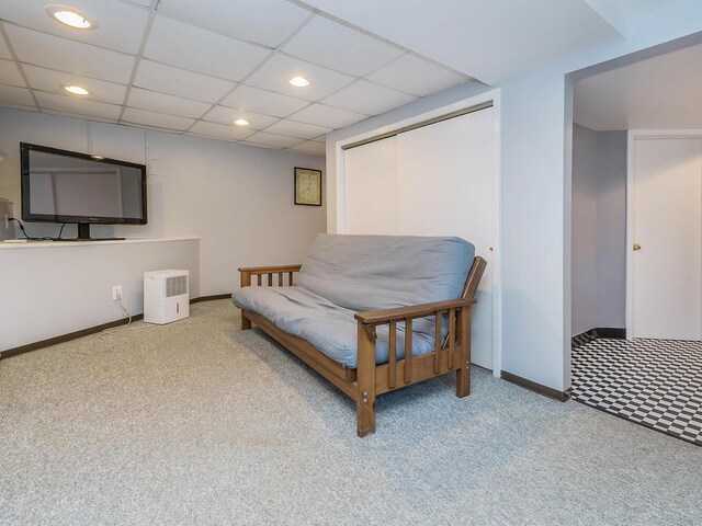 sitting room with carpet floors, recessed lighting, baseboards, and a paneled ceiling