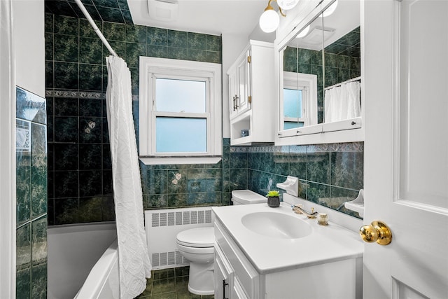 208 Wagner Ave, Mamaroneck, NY 10543 - full bath with radiator, tile walls, vanity, toilet, and shower / tub combo