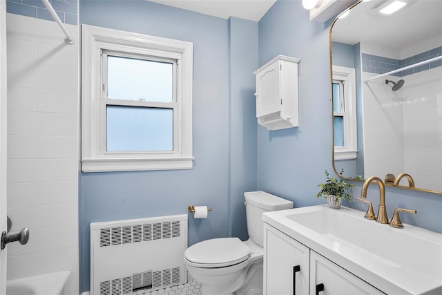 208 Wagner Ave, Mamaroneck, NY 10543 - bathroom with radiator heating unit, vanity, toilet, shower / bath combination, and tile patterned flooring