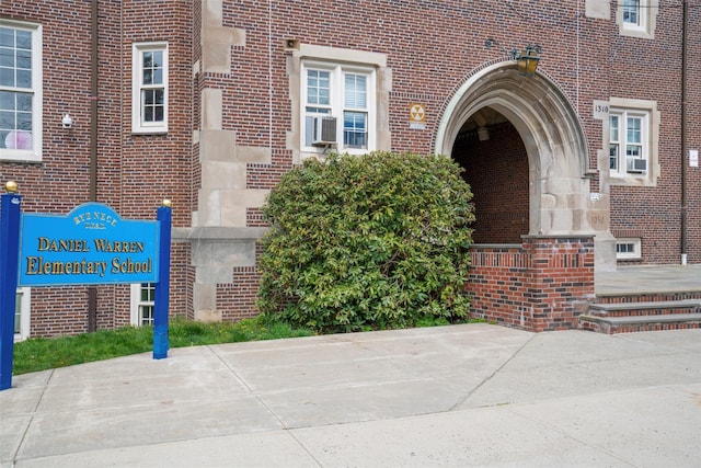 208 Wagner Ave, Mamaroneck, NY 10543 - doorway to property featuring brick siding and cooling unit