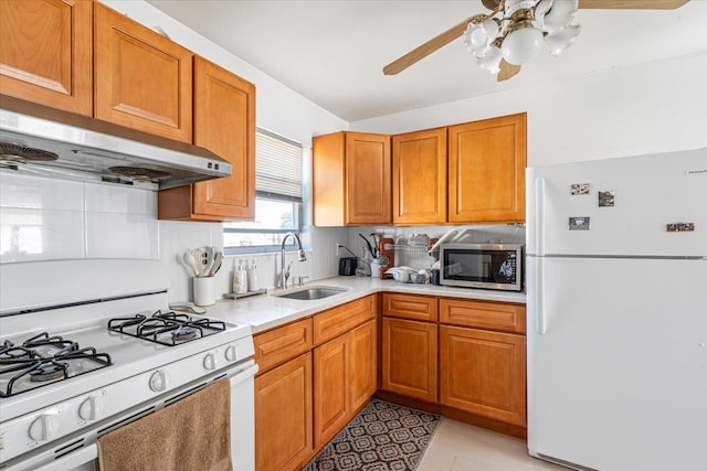 175 Frederick Ave, South Floral Park, NY 11001 - kitchen with white appliances, a sink, tasteful backsplash, light countertops, and a ceiling fan