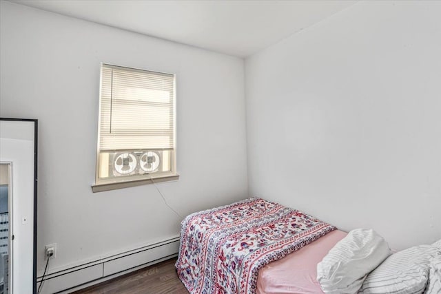175 Frederick Ave, South Floral Park, NY 11001 - bedroom featuring baseboard heating and wood finished floors