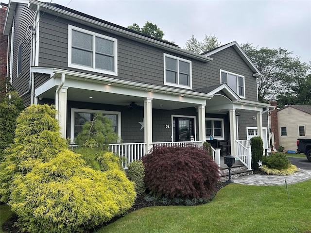 52 S Windhorst Ave, Bethpage, NY 11714 - view of front of property featuring a porch and a front yard