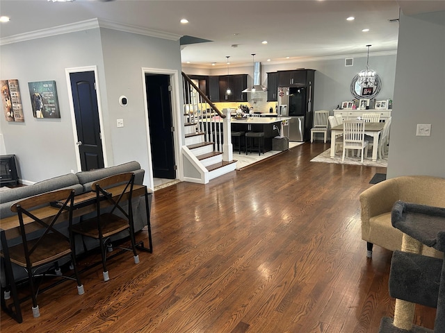 52 S Windhorst Ave, Bethpage, NY 11714 - living room with ornamental molding, recessed lighting, stairway, and dark wood-style flooring
