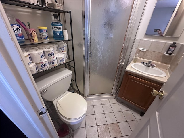 1903 Arnow Ave, Bronx, NY 10469 - full bath with a stall shower, tile patterned flooring, toilet, and vanity