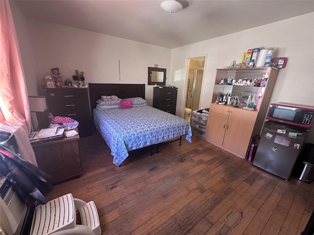 1903 Arnow Ave, Bronx, NY 10469 - bedroom with dark wood-type flooring