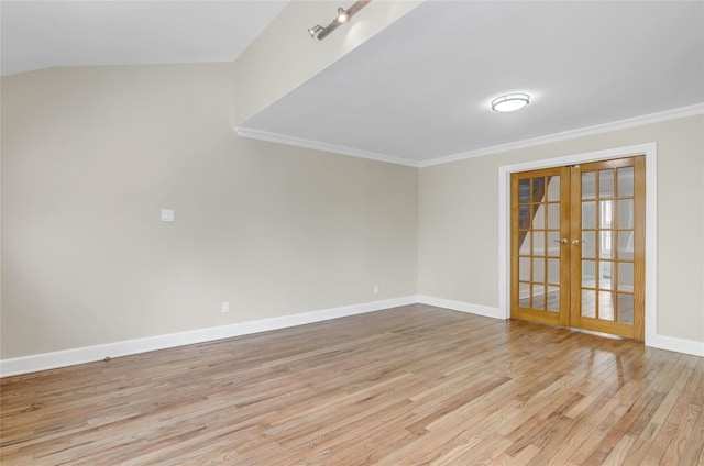 62-33 59th Dr, Maspeth, NY 11378 - spare room with french doors, crown molding, light wood finished floors, and baseboards