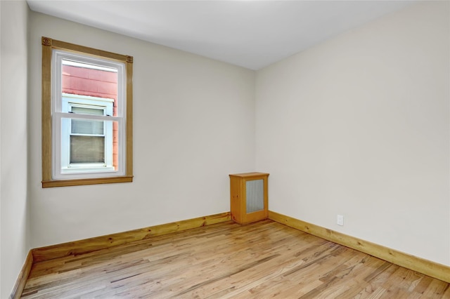 62-33 59th Dr, Maspeth, NY 11378 - empty room featuring light wood-style flooring and baseboards