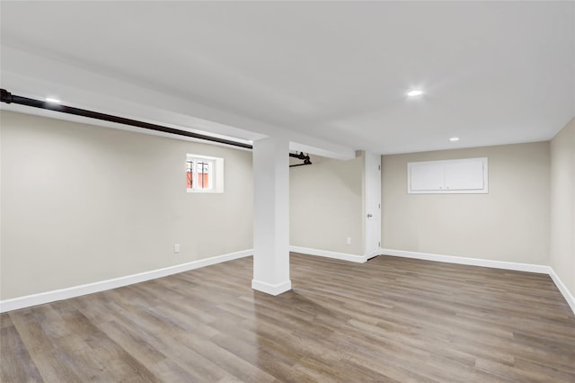 62-33 59th Dr, Maspeth, NY 11378 - basement featuring baseboards, recessed lighting, and wood finished floors