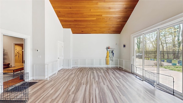 406 Duck Pond, Locust Valley, NY 11560 - empty room featuring high vaulted ceiling, light wood finished floors, wooden ceiling, and baseboards