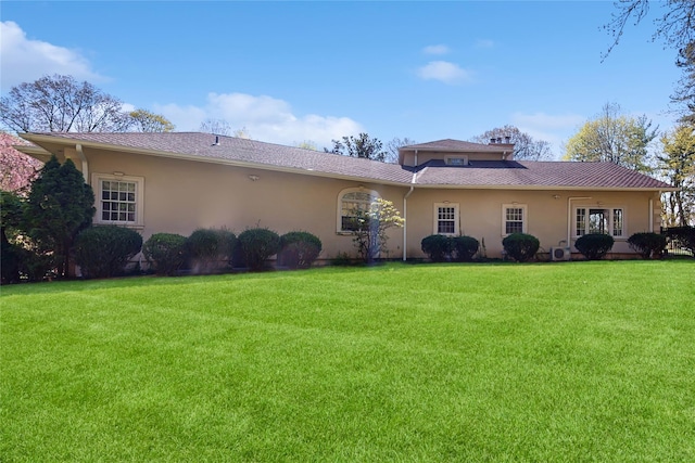 406 Duck Pond, Locust Valley, NY 11560 - rear view of property featuring stucco siding and a yard