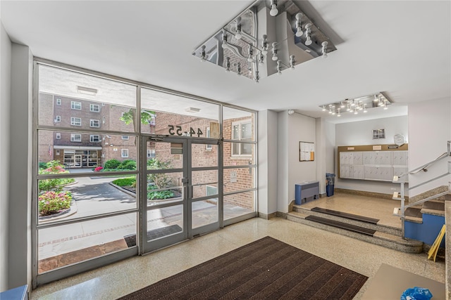 building lobby featuring a wall of windows