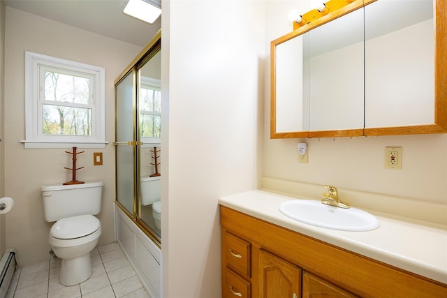 bathroom with toilet, a baseboard heating unit, tile patterned floors, vanity, and combined bath / shower with glass door