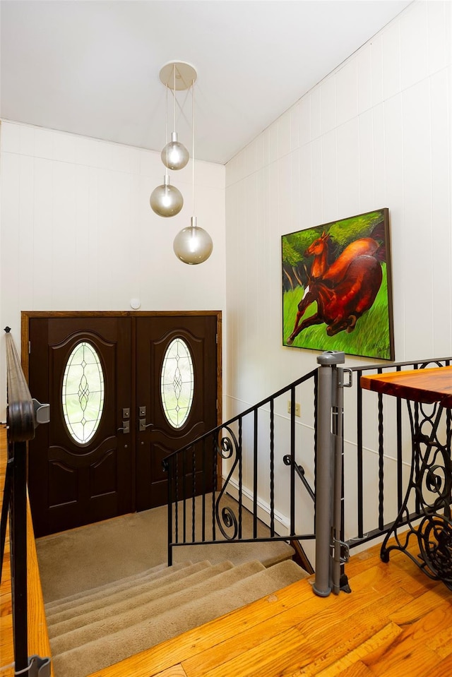 foyer entrance with wood finished floors