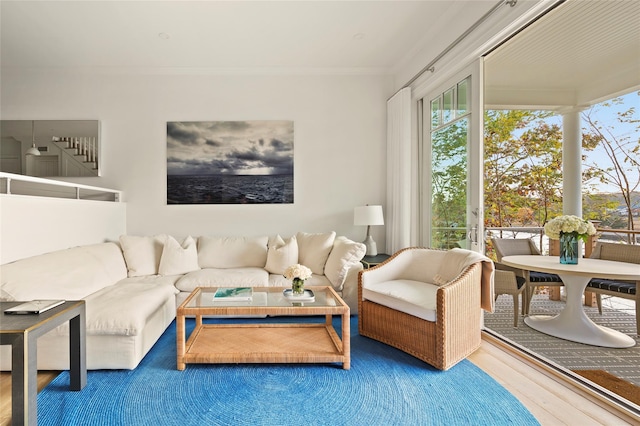 67 Old Boathouse Ln N, Hampton Bays, NY 11946 - living room with wood finished floors and crown molding