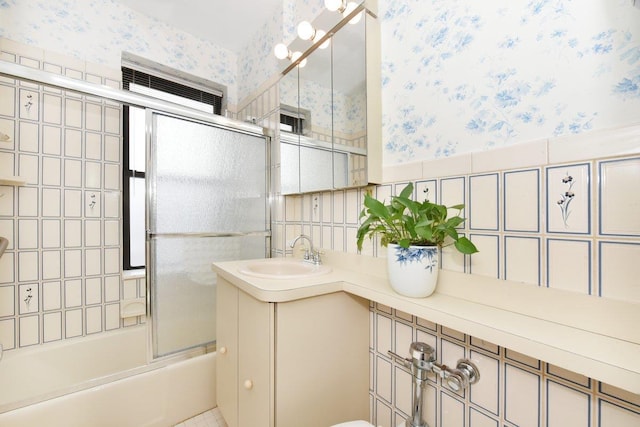 37BROMPTON Road 5-B, Great Neck, NY 11021 - full bathroom featuring wallpapered walls, shower / bath combination with glass door, and vanity