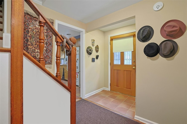 7 Southminster Dr, White Plains, NY 10604 - tiled entrance foyer with stairway and baseboards